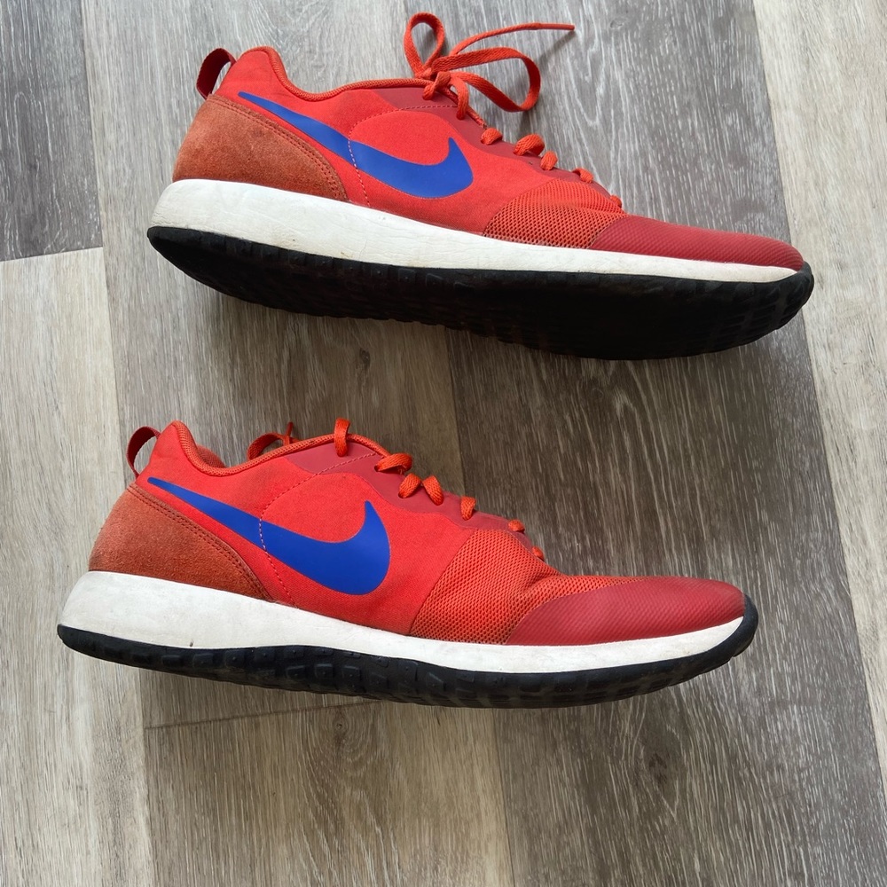 Nike Running Shoes.  Orange.  Size 12 Men.